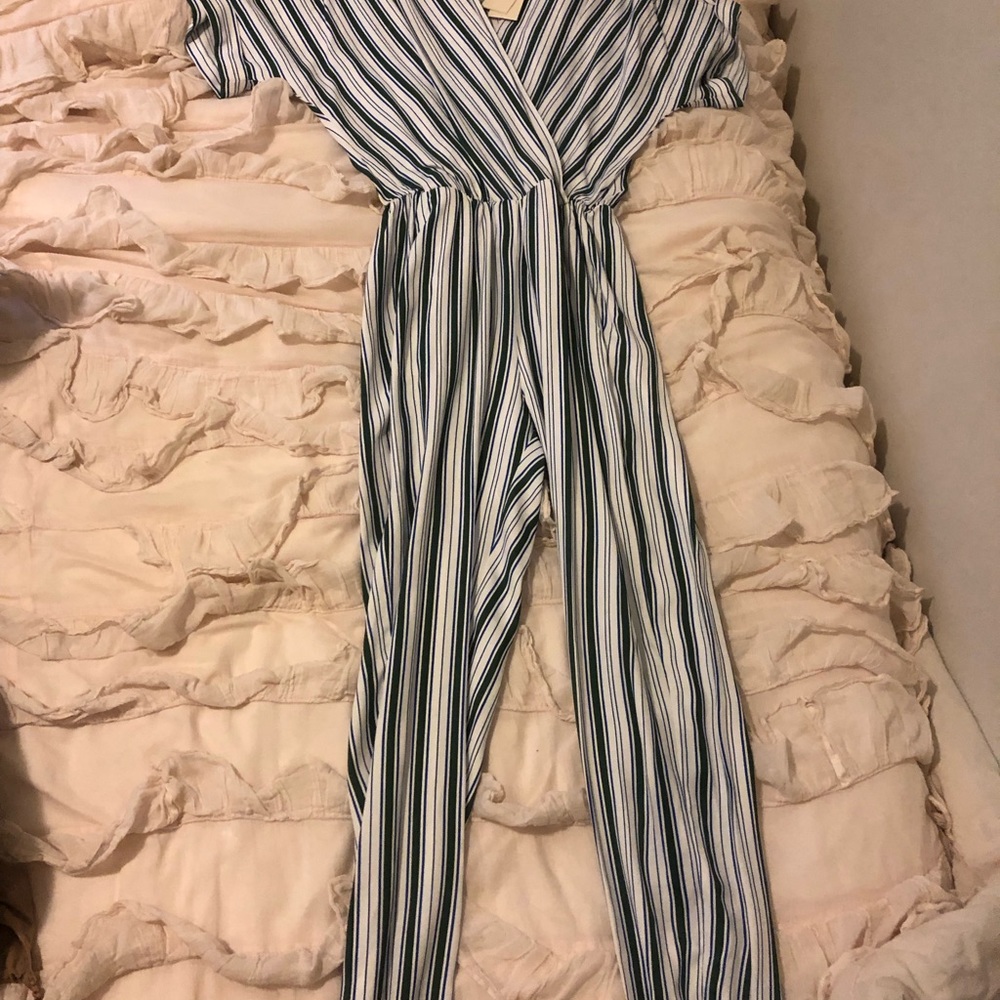 Never worn Maje romper, size 34. Has pockets!